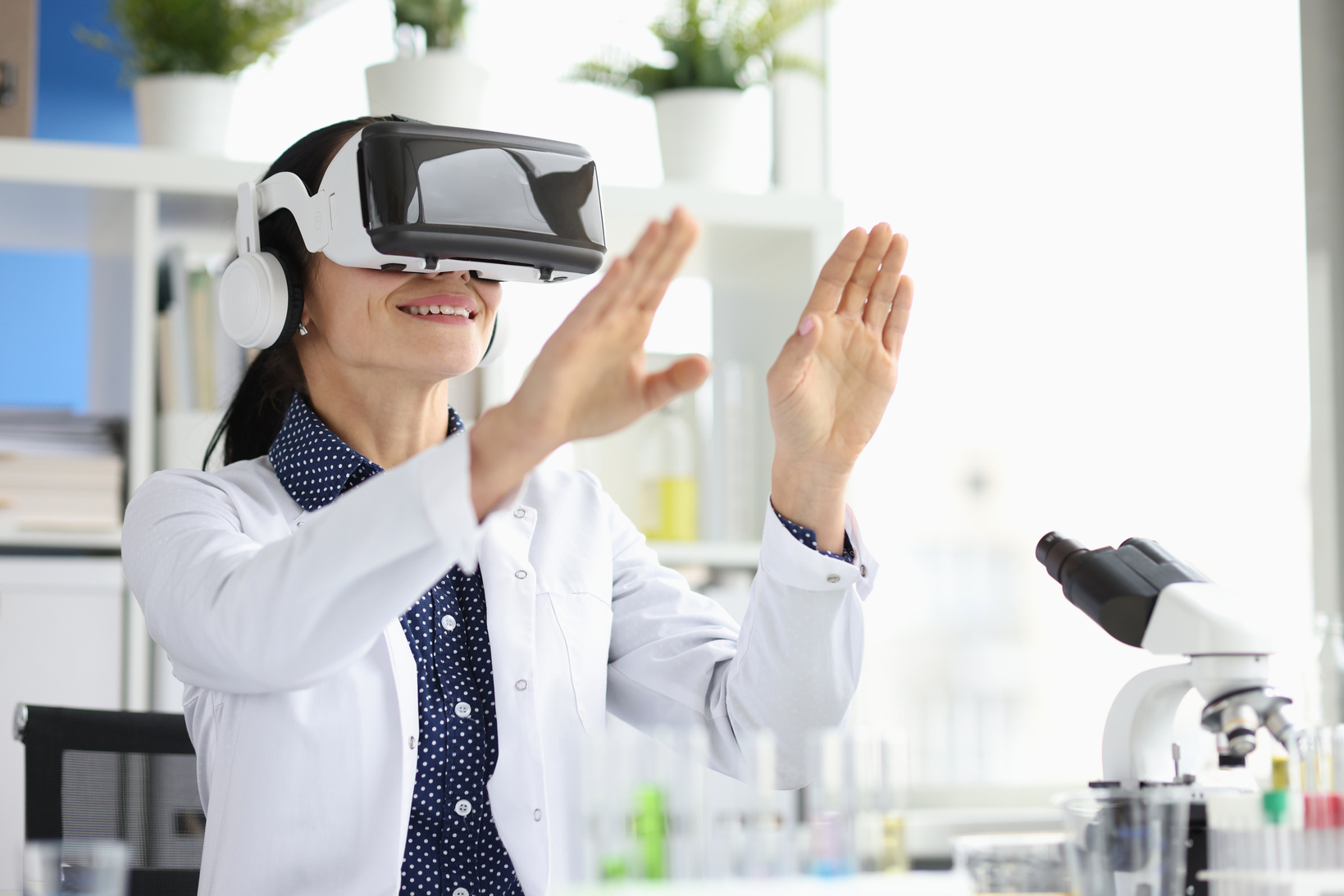 Doctor Wearing Virtual Glasses in Virtual Reality in Laboratory